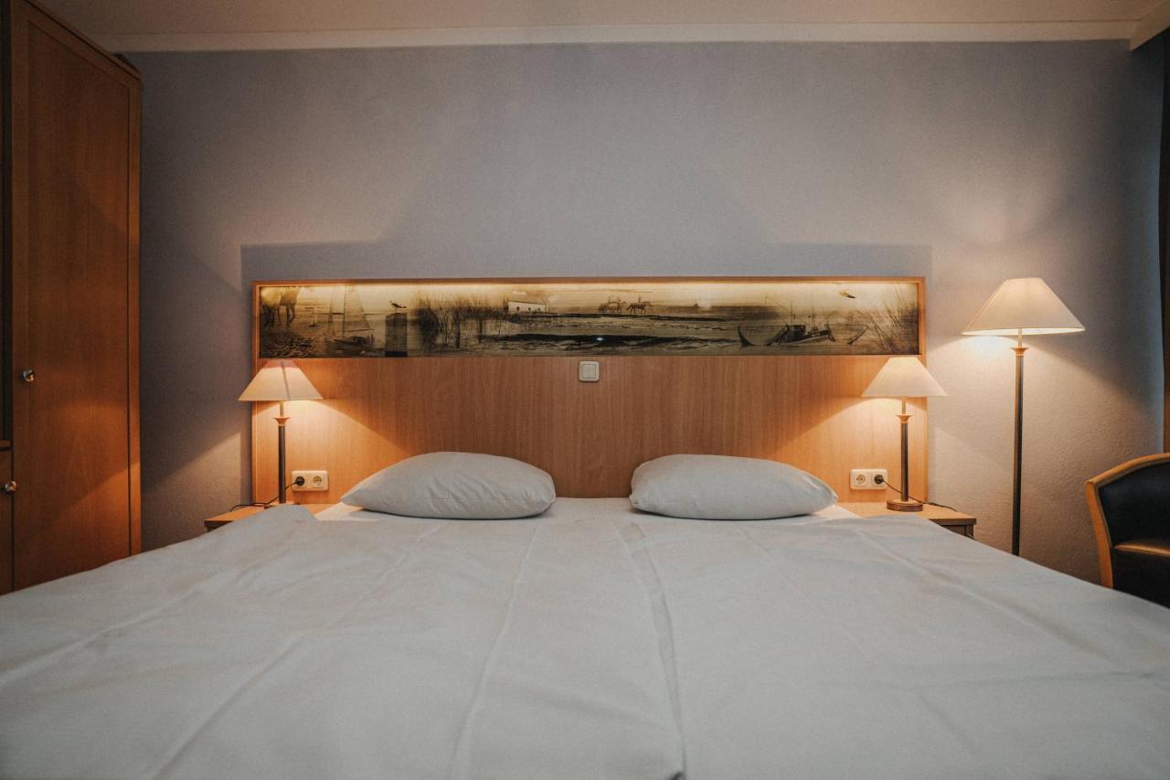 Отель Hotel Spiekeroog Шпикерог